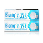 Zwei Packungen „Bioniq White Filler“ Whitening-Zahnpasta; Claims: „für eine glatte + weiße Zahnoberfläche“, „Filler-Technologie mit 20 % künstlichem Zahnschmelz“.