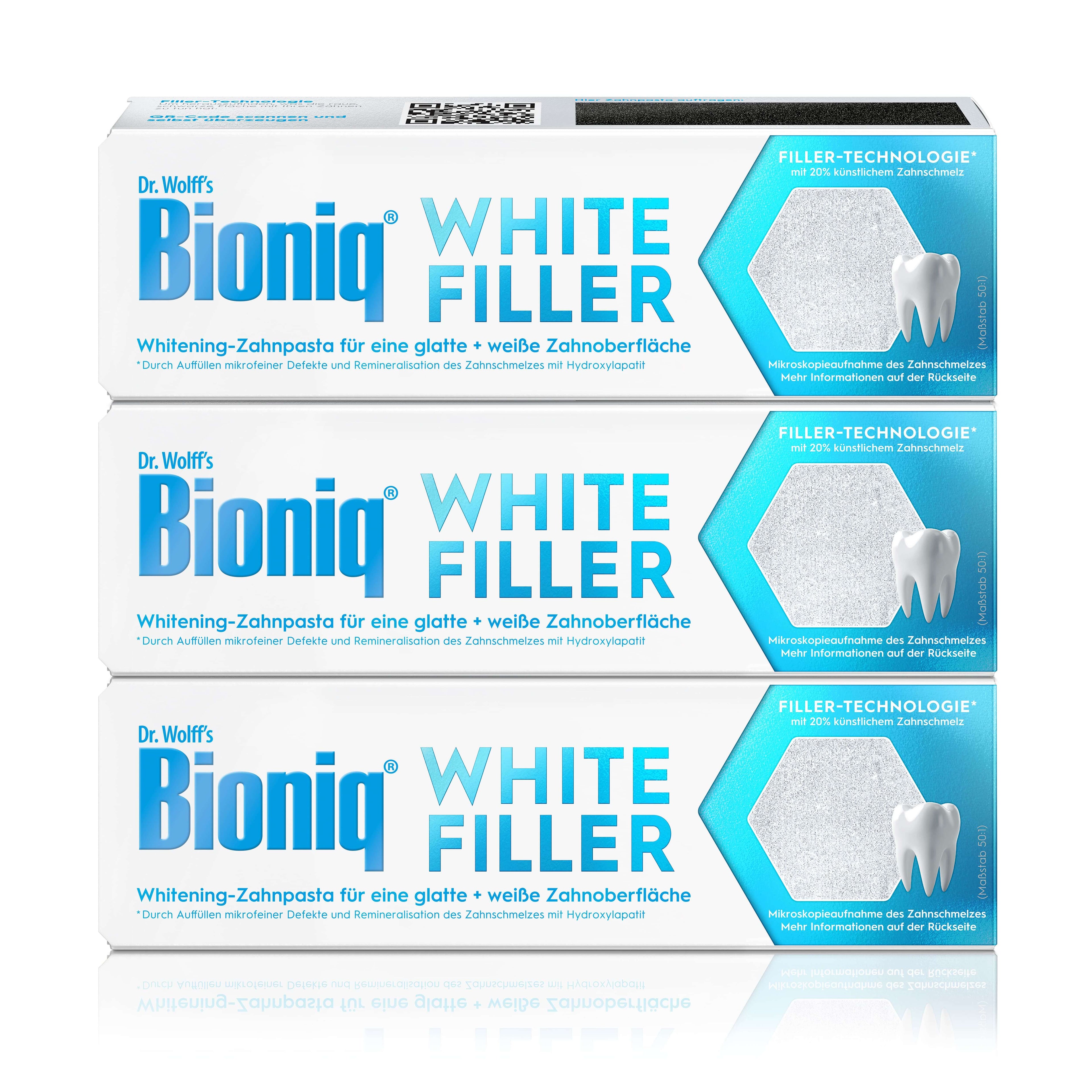 Drei Packungen „Bioniq White Filler“ Whitening-Zahnpasta; Claims: „für eine glatte + weiße Zahnoberfläche“, „Filler-Technologie mit 20 % künstlichem Zahnschmelz“.